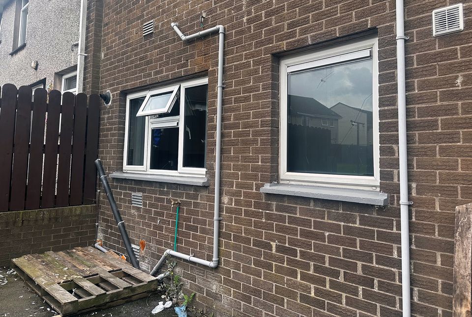 The smashed windows in his flat